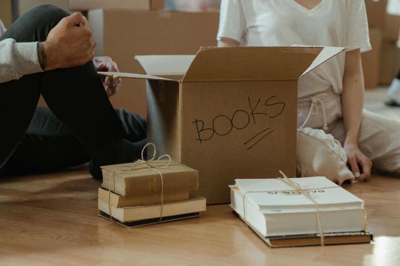 people packing boxes